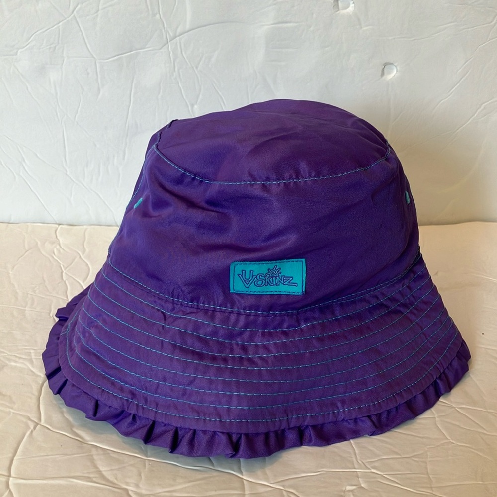 Girls UV skinz purple reversible bucket hat
